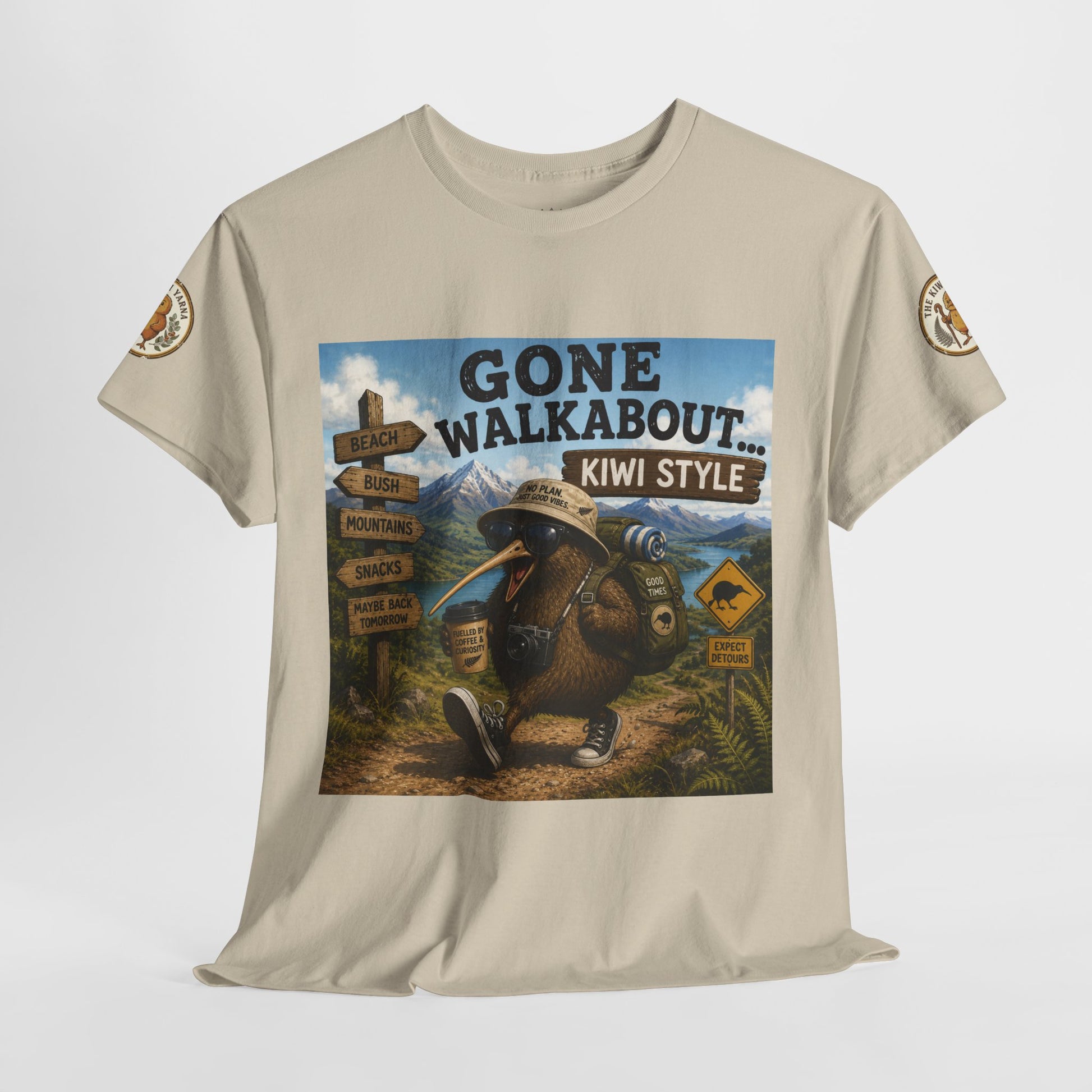 Natural T-shirt with large “Gone Walkabout Kiwi Style” front graphic and logo sleeve patches.
