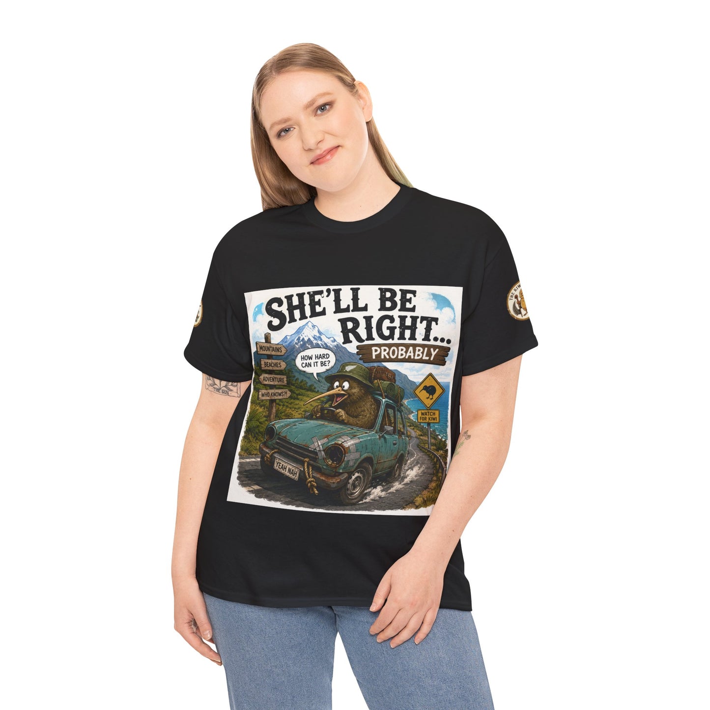 Black graphic T-shirt with chest text and outdoor vehicle illustration on model