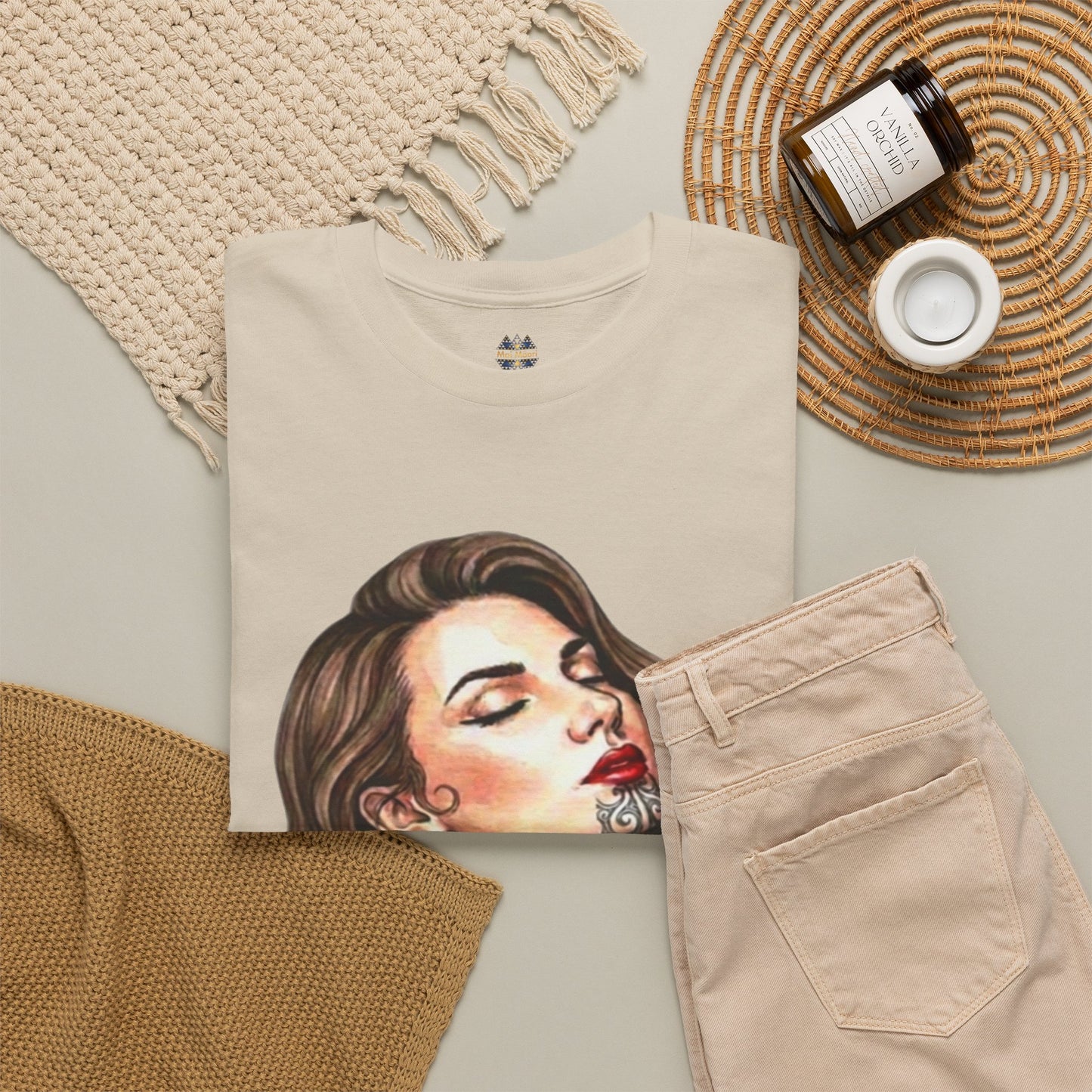Beige graphic T-shirt with close-up woman face print and a small chest logo