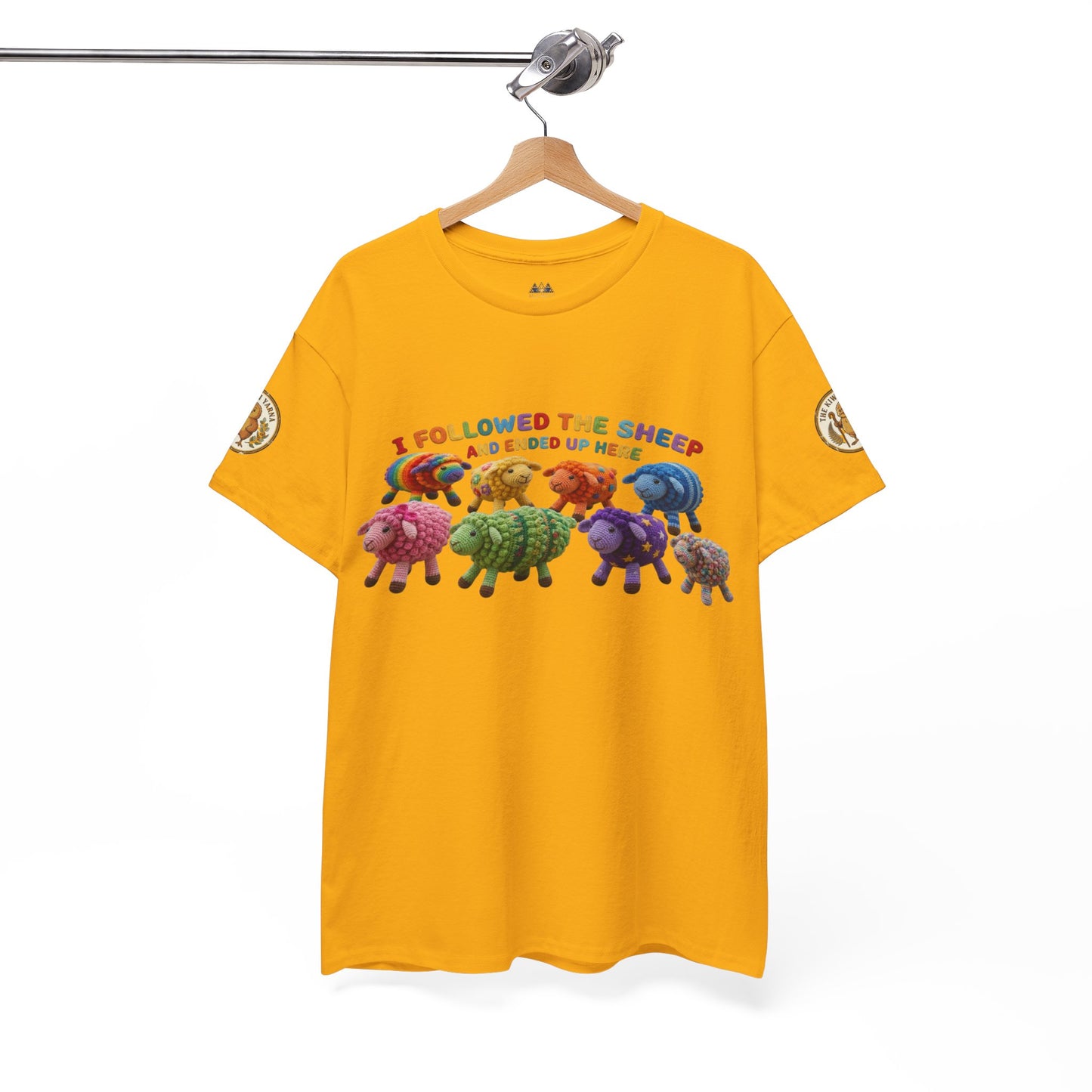 Mustard yellow graphic T-shirt on hanger with centered multicolor sheep design