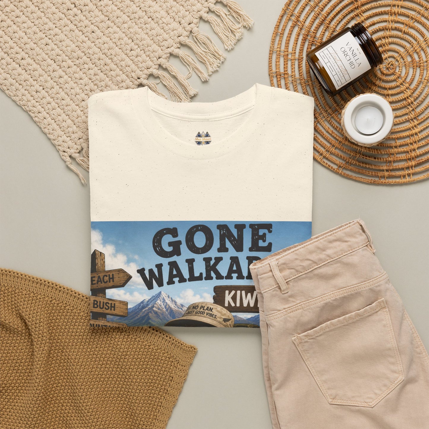 Cream graphic T-shirt with "Gone Walkabout Kiwi Style" front print and crew neck