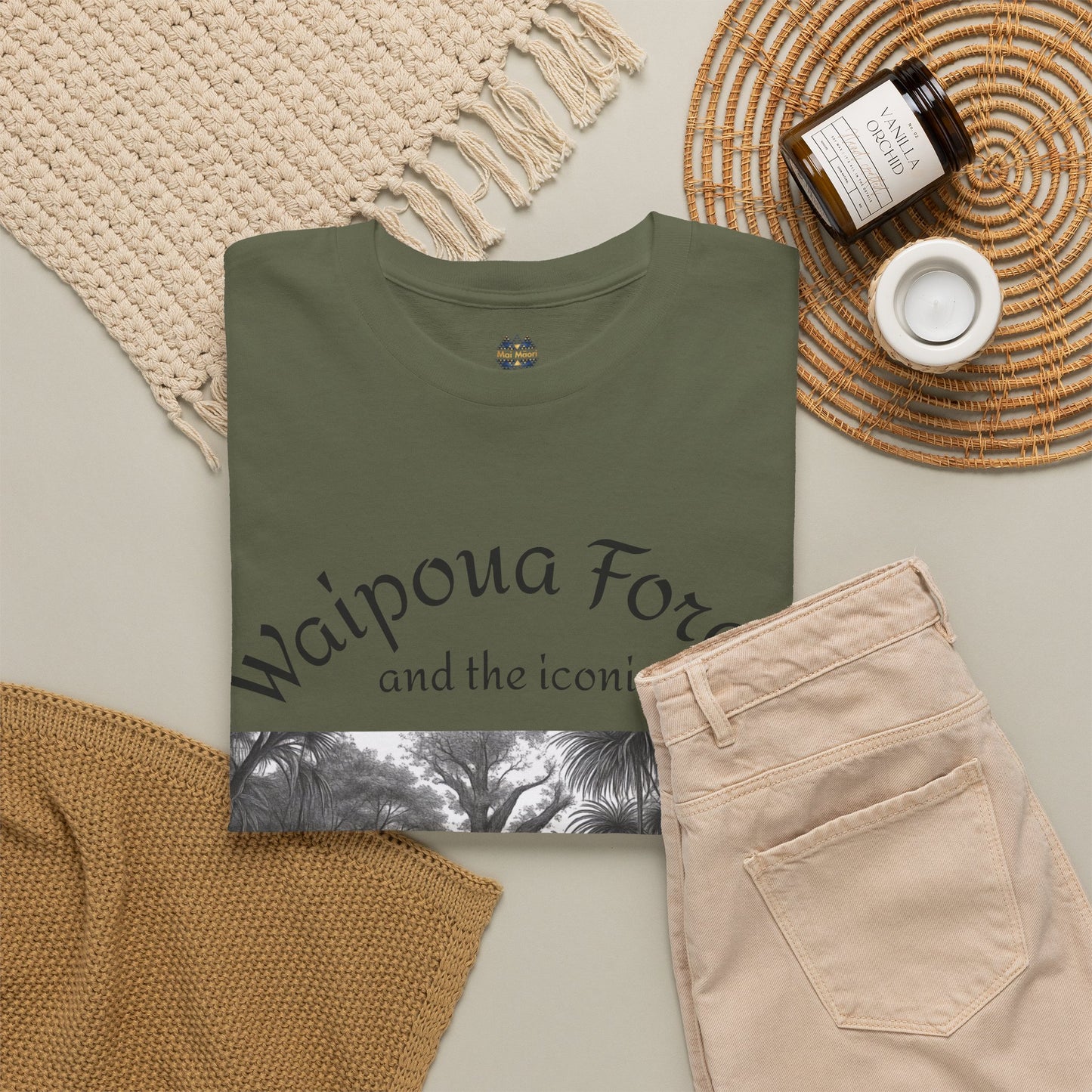 Olive T-shirt with partial Waipoua Forest text and black-and-white forest graphic
