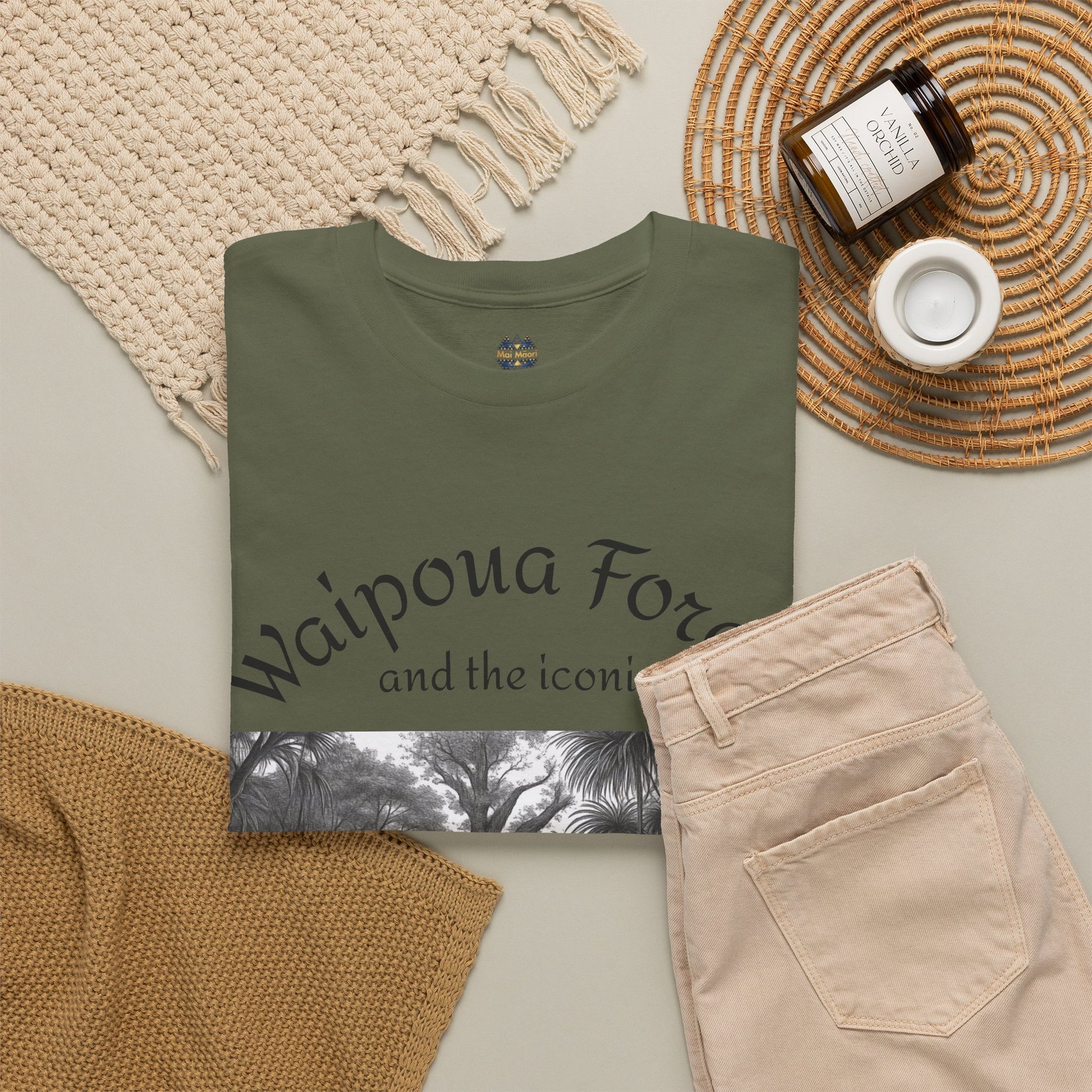 Olive T-shirt with partial Waipoua Forest text and black-and-white forest graphic