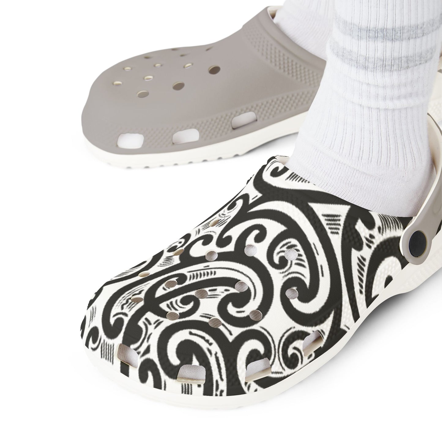 Ponga clogs, gray perforated top with black-and-white paisley upper and white sock