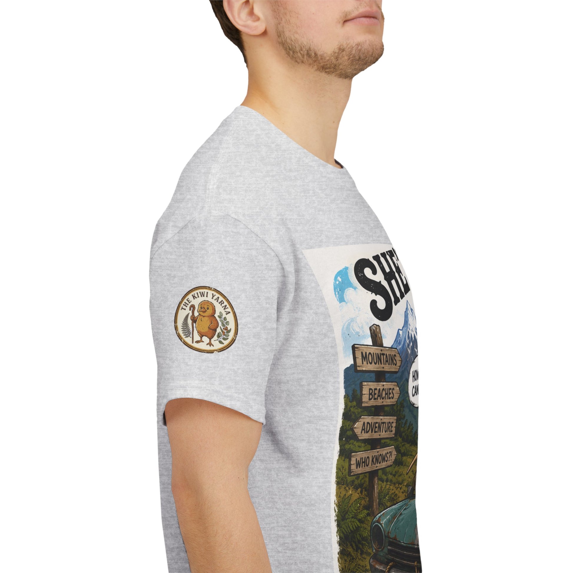 Heather gray graphic T-shirt with sleeve patch emblem and side view of front print.