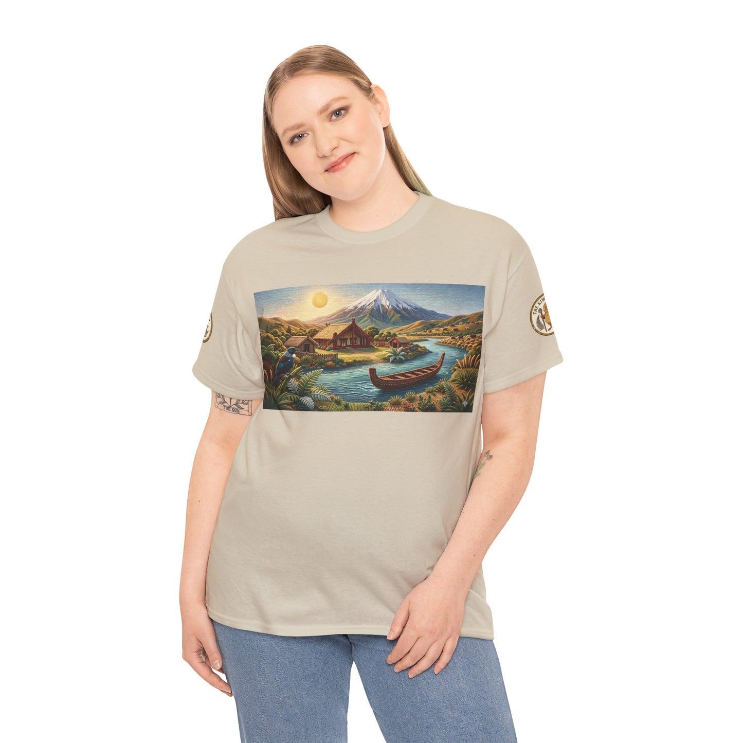 Cream graphic t-shirt worn by model, featuring landscape print panel and sleeve patch