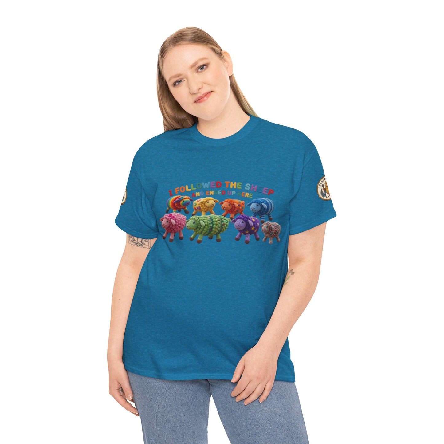 Teal crew-neck T-shirt with colorful sheep graphic worn by model