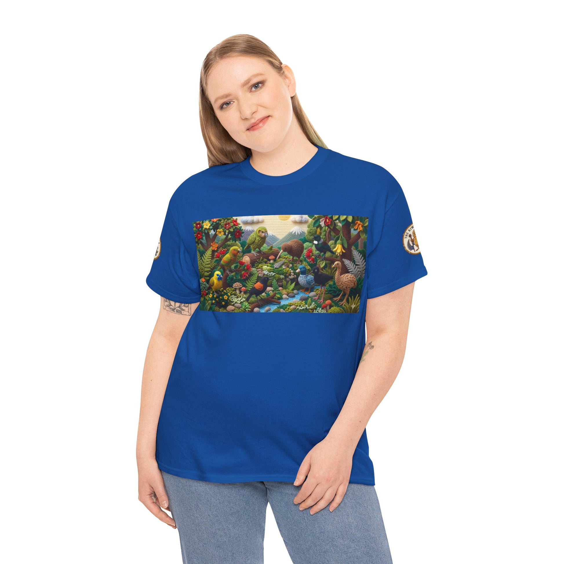 Blue graphic T-shirt worn by model with rectangular bird scene panel