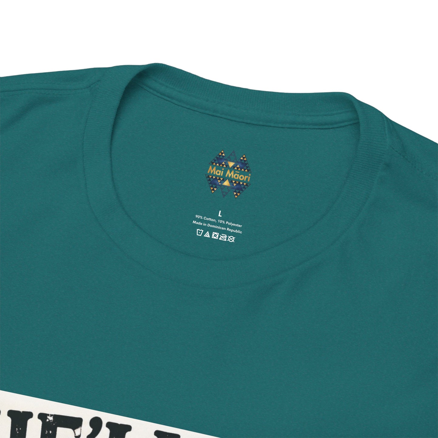 Close-up of teal T-shirt crew neck with small chest logo.
