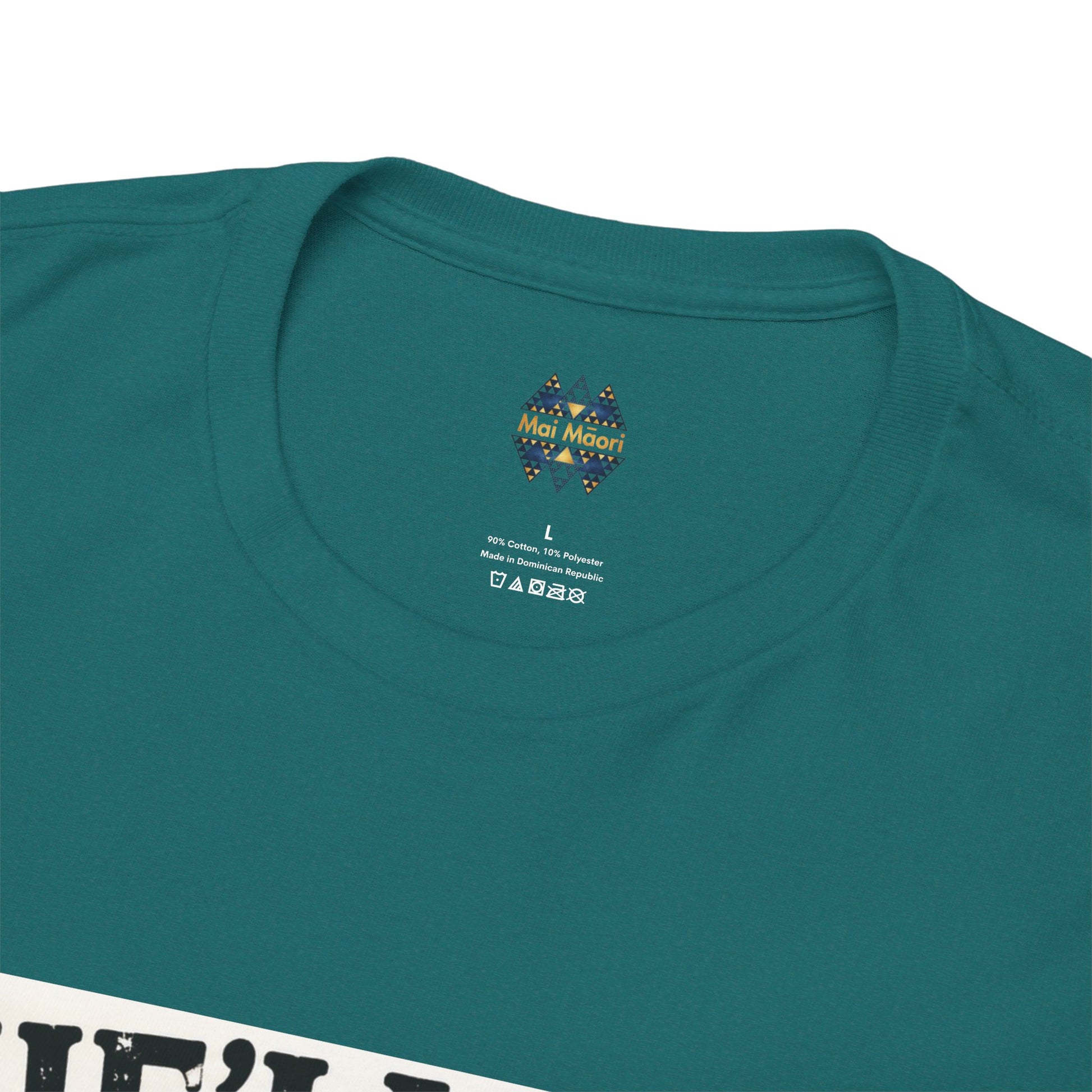 Close-up of teal T-shirt crew neck with small chest logo.