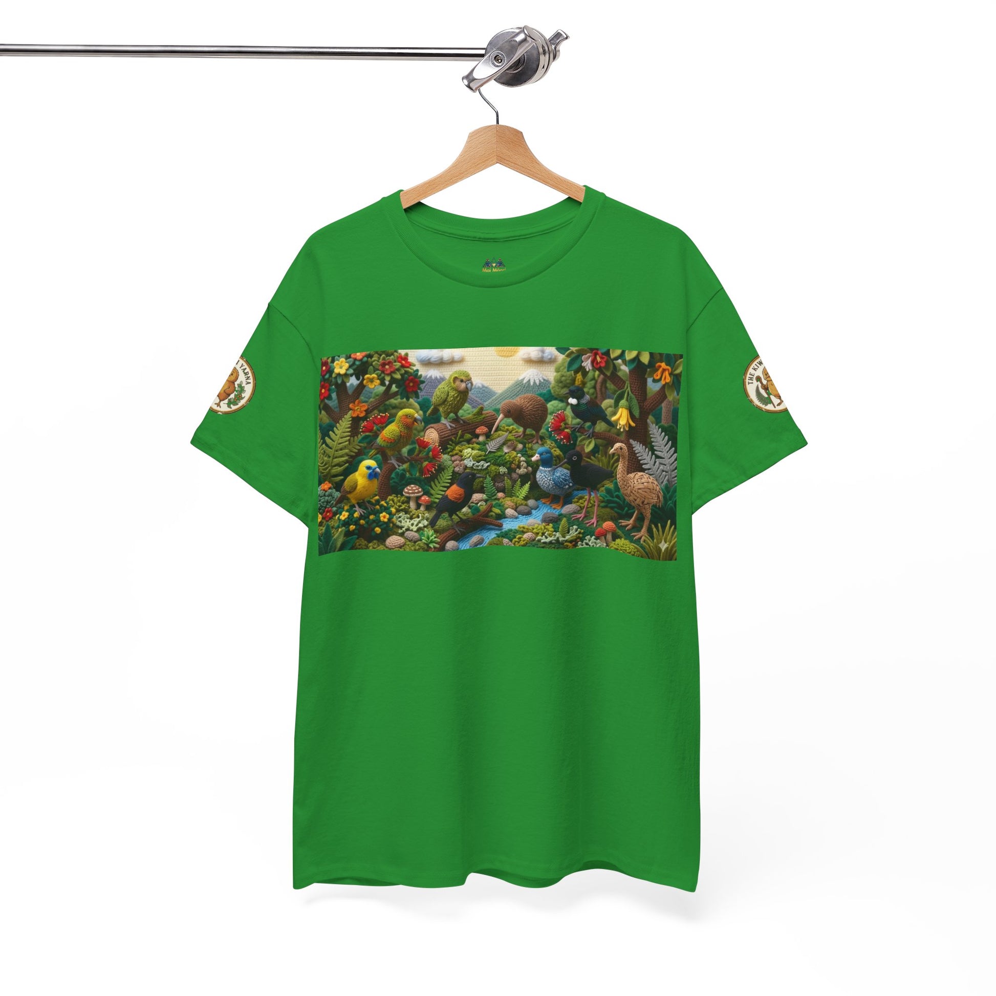 Green crew-neck T-shirt with centered colorful birds-and-forest rectangle front graphic