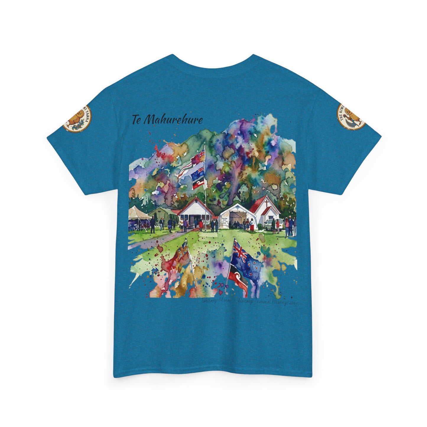 Teal T-shirt with colorful village scene back print and sleeve emblems