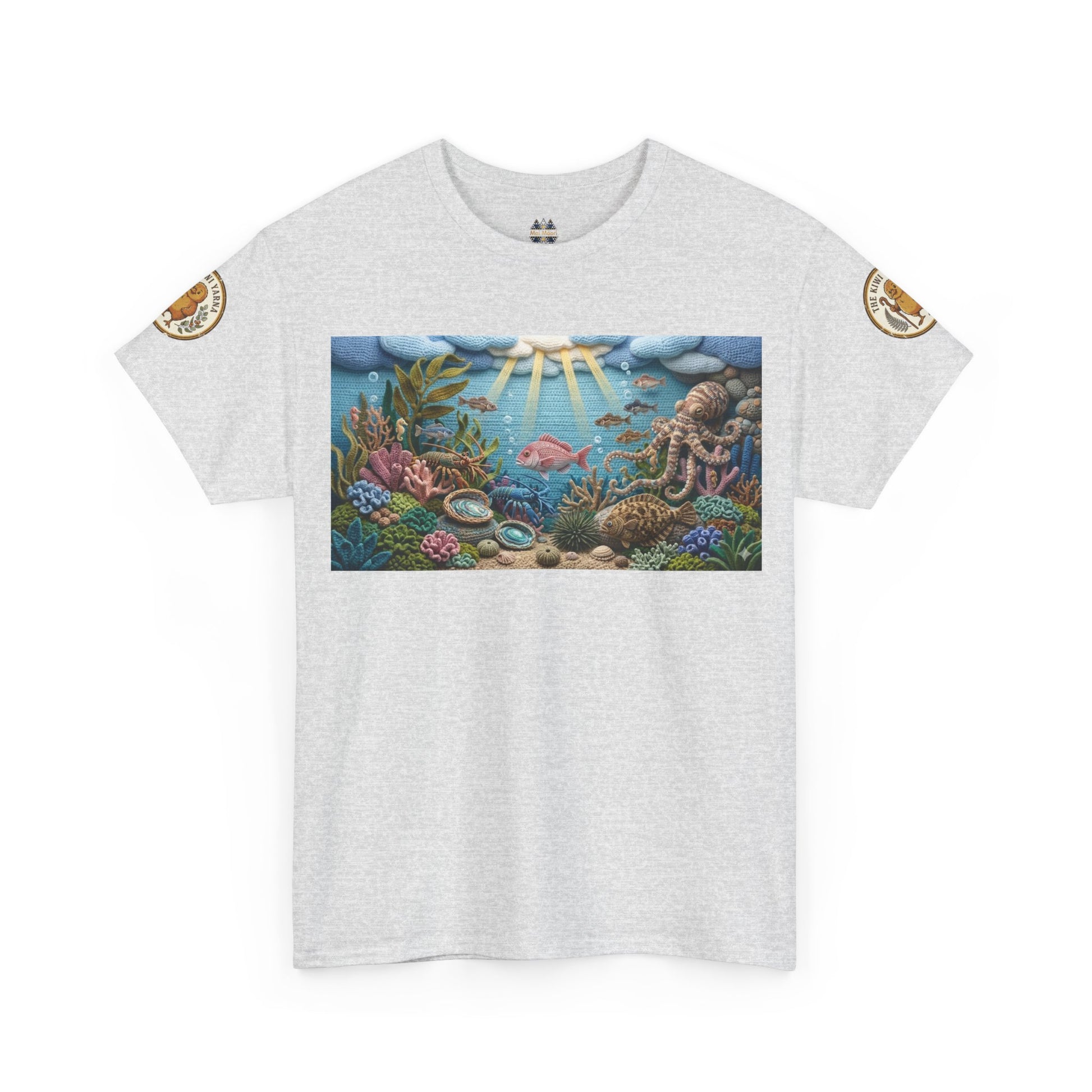 Light gray T-shirt with centered underwater reef graphic panel; small circular arm patches.