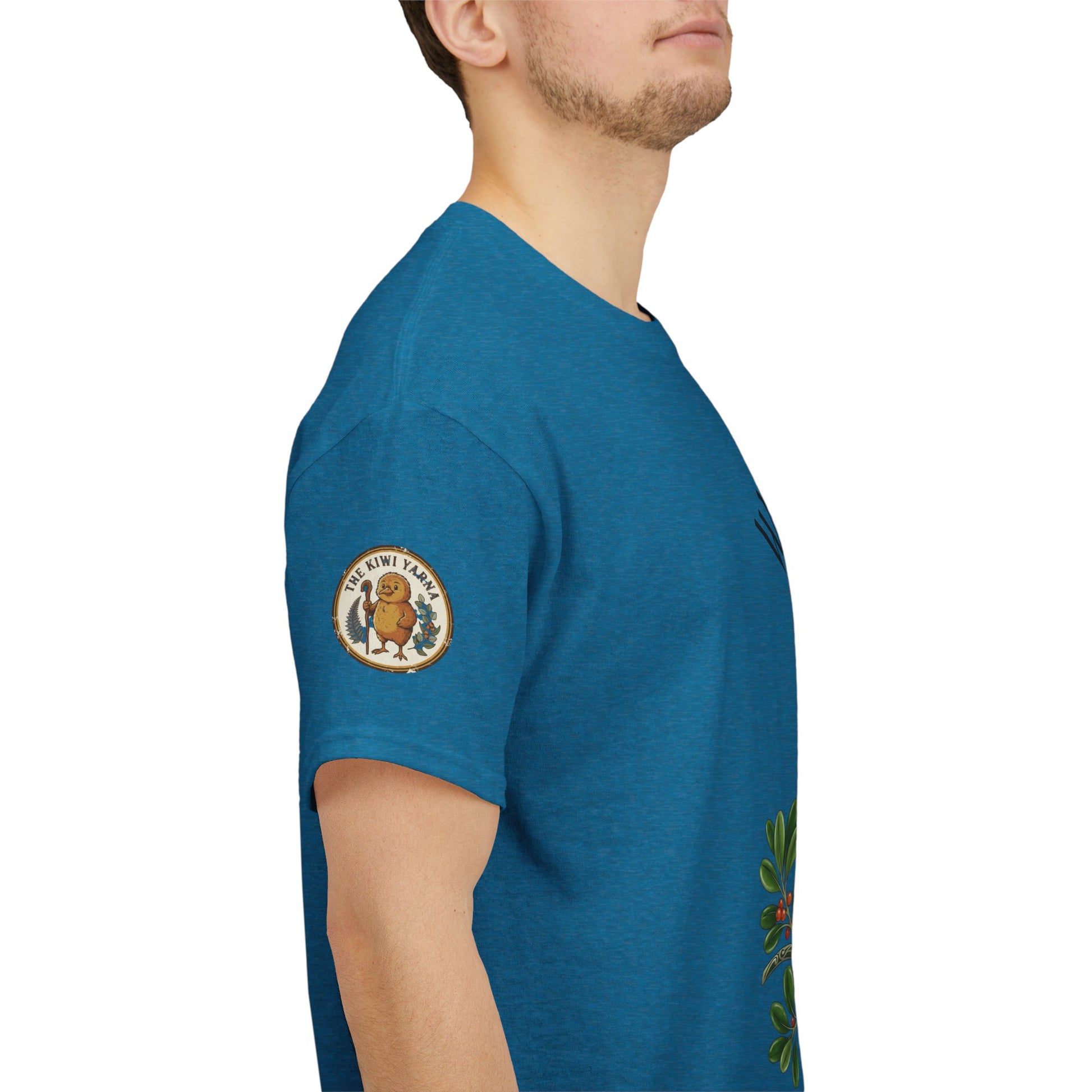 Teal crewneck T-shirt side view with circular crest graphic on sleeve